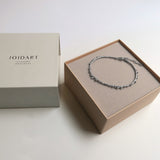 Armband / GUSPIRA / versilbert